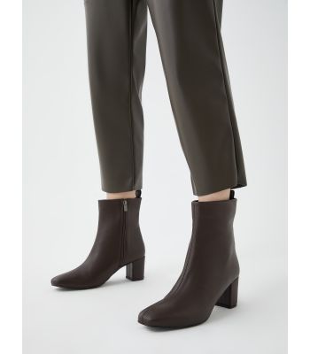 Women's Leather Look Zippered Heeled Boots.