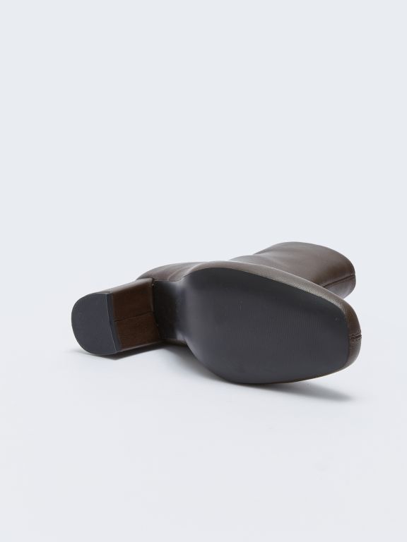 Women's Leather Look Zippered Heeled Boots.